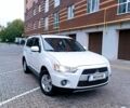 Білий Міцубісі Аутлендер, об'ємом двигуна 2.4 л та пробігом 180 тис. км за 9900 $, фото 1 на Automoto.ua