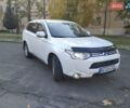 Белый Мицубиси Аутлендер, объемом двигателя 2 л и пробегом 344 тыс. км за 9999 $, фото 1 на Automoto.ua