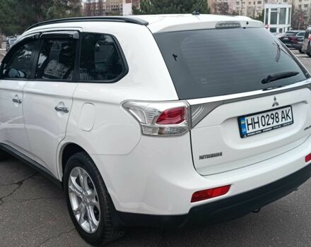 Білий Міцубісі Аутлендер, об'ємом двигуна 2.4 л та пробігом 112 тис. км за 15000 $, фото 2 на Automoto.ua