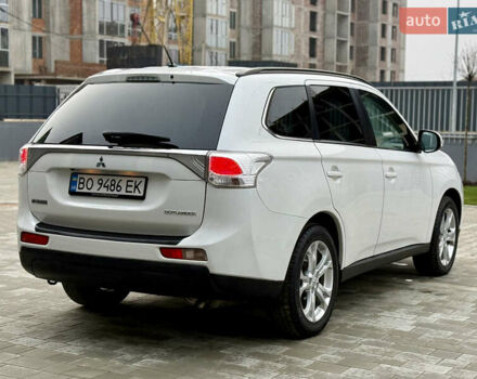 Белый Мицубиси Аутлендер, объемом двигателя 2.27 л и пробегом 264 тыс. км за 13500 $, фото 59 на Automoto.ua