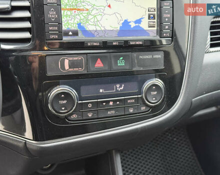 Белый Мицубиси Аутлендер, объемом двигателя 2.27 л и пробегом 264 тыс. км за 13500 $, фото 33 на Automoto.ua