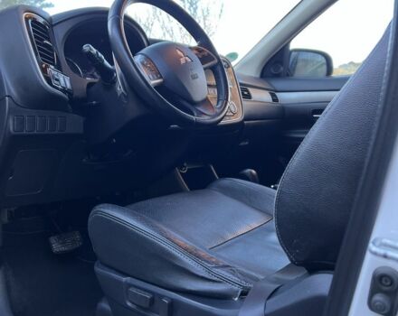 Білий Міцубісі Аутлендер, об'ємом двигуна 2.3 л та пробігом 215 тис. км за 12800 $, фото 17 на Automoto.ua