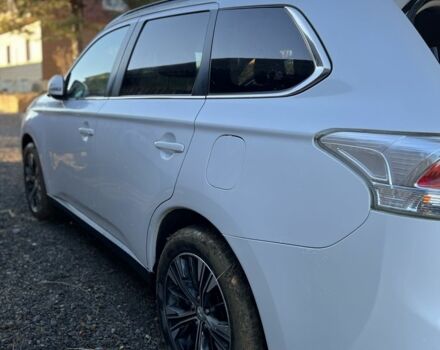 Білий Міцубісі Аутлендер, об'ємом двигуна 2.3 л та пробігом 215 тис. км за 12800 $, фото 8 на Automoto.ua