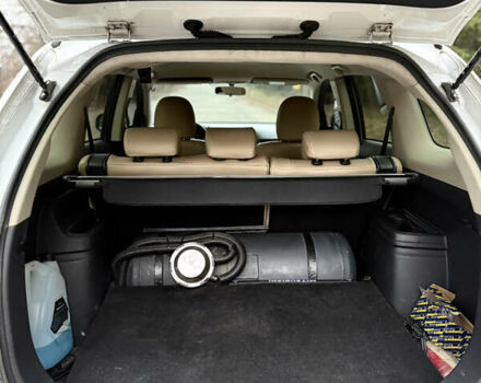 Білий Міцубісі Аутлендер, об'ємом двигуна 2 л та пробігом 150 тис. км за 11000 $, фото 12 на Automoto.ua