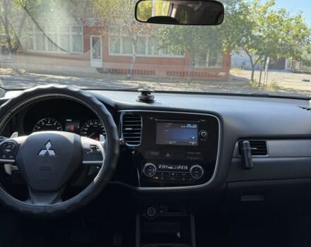 Белый Мицубиси Аутлендер, объемом двигателя 2 л и пробегом 174 тыс. км за 12999 $, фото 5 на Automoto.ua