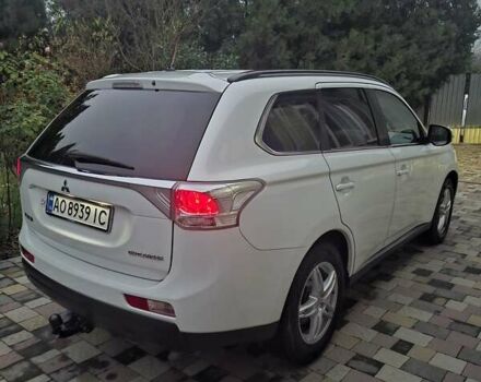 Белый Мицубиси Аутлендер, объемом двигателя 2.3 л и пробегом 247 тыс. км за 14100 $, фото 1 на Automoto.ua
