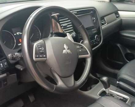 Білий Міцубісі Аутлендер, об'ємом двигуна 2.4 л та пробігом 112 тис. км за 15000 $, фото 5 на Automoto.ua