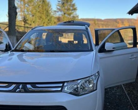 Білий Міцубісі Аутлендер, об'ємом двигуна 2.27 л та пробігом 215 тис. км за 12800 $, фото 4 на Automoto.ua