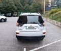 Белый Мицубиси Аутлендер, объемом двигателя 2.4 л и пробегом 180 тыс. км за 9899 $, фото 18 на Automoto.ua