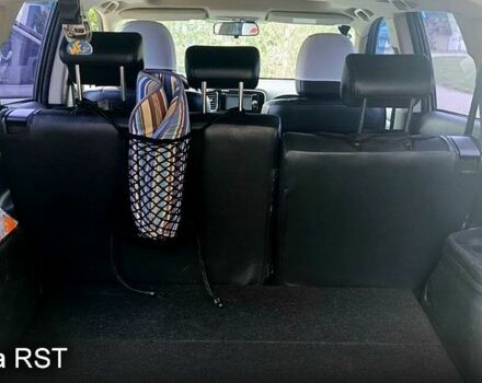 Белый Мицубиси Аутлендер, объемом двигателя 2.4 л и пробегом 300 тыс. км за 12500 $, фото 6 на Automoto.ua