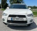 Белый Мицубиси Аутлендер, объемом двигателя 2.27 л и пробегом 228 тыс. км за 12000 $, фото 1 на Automoto.ua
