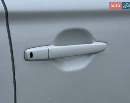 Белый Мицубиси Аутлендер, объемом двигателя 2.27 л и пробегом 264 тыс. км за 13500 $, фото 45 на Automoto.ua