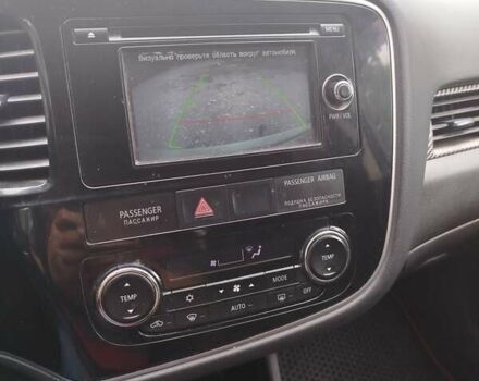Білий Міцубісі Аутлендер, об'ємом двигуна 2 л та пробігом 236 тис. км за 9600 $, фото 2 на Automoto.ua