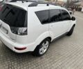 Білий Міцубісі Аутлендер, об'ємом двигуна 2.4 л та пробігом 174 тис. км за 12500 $, фото 4 на Automoto.ua