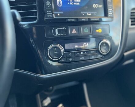 Білий Міцубісі Аутлендер, об'ємом двигуна 2.3 л та пробігом 215 тис. км за 12800 $, фото 13 на Automoto.ua