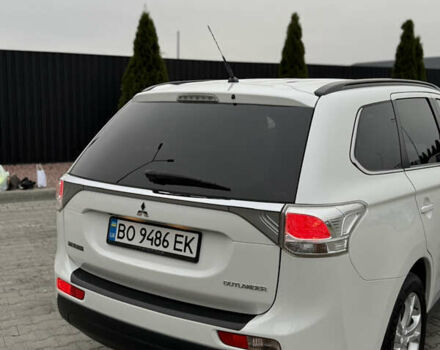 Белый Мицубиси Аутлендер, объемом двигателя 2.2 л и пробегом 262 тыс. км за 12800 $, фото 4 на Automoto.ua