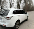 Білий Міцубісі Аутлендер, об'ємом двигуна 2 л та пробігом 150 тис. км за 11000 $, фото 4 на Automoto.ua