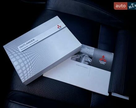 Білий Міцубісі Аутлендер, об'ємом двигуна 2.4 л та пробігом 154 тис. км за 12999 $, фото 21 на Automoto.ua