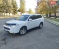Белый Мицубиси Аутлендер, объемом двигателя 2 л и пробегом 344 тыс. км за 9999 $, фото 4 на Automoto.ua