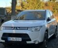 Білий Міцубісі Аутлендер, об'ємом двигуна 2.3 л та пробігом 215 тис. км за 12800 $, фото 4 на Automoto.ua