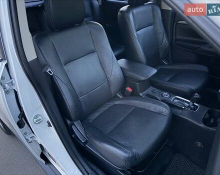 Білий Міцубісі Аутлендер, об'ємом двигуна 2.4 л та пробігом 154 тис. км за 12999 $, фото 14 на Automoto.ua