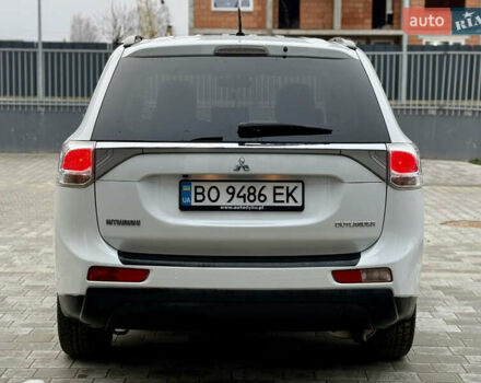 Белый Мицубиси Аутлендер, объемом двигателя 2.27 л и пробегом 264 тыс. км за 13500 $, фото 60 на Automoto.ua