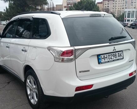 Білий Міцубісі Аутлендер, об'ємом двигуна 2.4 л та пробігом 112 тис. км за 15000 $, фото 6 на Automoto.ua