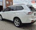 Белый Мицубиси Аутлендер, объемом двигателя 2 л и пробегом 114 тыс. км за 13200 $, фото 6 на Automoto.ua