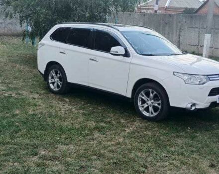 Білий Міцубісі Аутлендер, об'ємом двигуна 2.4 л та пробігом 300 тис. км за 12500 $, фото 4 на Automoto.ua