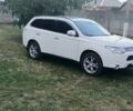 Білий Міцубісі Аутлендер, об'ємом двигуна 2.4 л та пробігом 300 тис. км за 12500 $, фото 4 на Automoto.ua