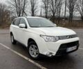 Білий Міцубісі Аутлендер, об'ємом двигуна 2.3 л та пробігом 255 тис. км за 13000 $, фото 1 на Automoto.ua