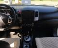 Білий Міцубісі Аутлендер, об'ємом двигуна 2.4 л та пробігом 167 тис. км за 11500 $, фото 3 на Automoto.ua