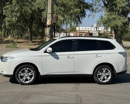 Белый Мицубиси Аутлендер, объемом двигателя 2 л и пробегом 174 тыс. км за 12999 $, фото 2 на Automoto.ua