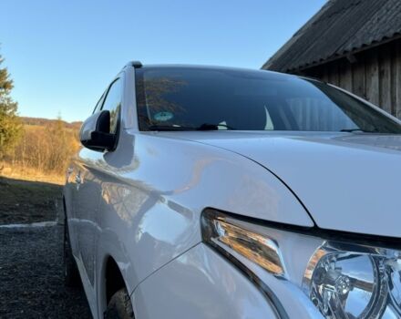 Білий Міцубісі Аутлендер, об'ємом двигуна 2.3 л та пробігом 215 тис. км за 12800 $, фото 6 на Automoto.ua