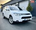 Білий Міцубісі Аутлендер, об'ємом двигуна 2.4 л та пробігом 154 тис. км за 12999 $, фото 1 на Automoto.ua