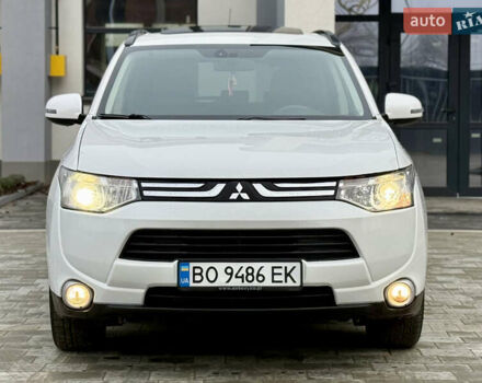 Белый Мицубиси Аутлендер, объемом двигателя 2.27 л и пробегом 264 тыс. км за 13500 $, фото 2 на Automoto.ua
