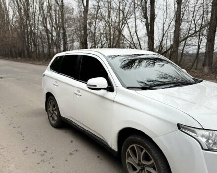 Білий Міцубісі Аутлендер, об'ємом двигуна 2 л та пробігом 150 тис. км за 11000 $, фото 3 на Automoto.ua