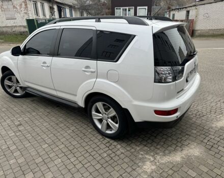 Білий Міцубісі Аутлендер, об'ємом двигуна 2.4 л та пробігом 174 тис. км за 12500 $, фото 2 на Automoto.ua