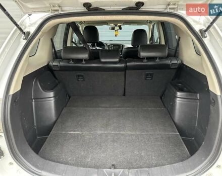 Білий Міцубісі Аутлендер, об'ємом двигуна 2.27 л та пробігом 177 тис. км за 11650 $, фото 11 на Automoto.ua