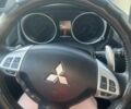 Белый Мицубиси Аутлендер, объемом двигателя 2 л и пробегом 140 тыс. км за 10600 $, фото 17 на Automoto.ua