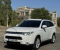 Белый Мицубиси Аутлендер, объемом двигателя 2 л и пробегом 174 тыс. км за 12999 $, фото 1 на Automoto.ua