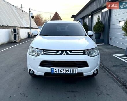 Білий Міцубісі Аутлендер, об'ємом двигуна 2.4 л та пробігом 154 тис. км за 12999 $, фото 2 на Automoto.ua
