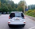 Белый Мицубиси Аутлендер, объемом двигателя 2.4 л и пробегом 180 тыс. км за 9900 $, фото 2 на Automoto.ua