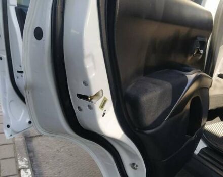 Білий Міцубісі Аутлендер, об'ємом двигуна 2.4 л та пробігом 167 тис. км за 11500 $, фото 5 на Automoto.ua
