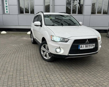Белый Мицубиси Аутлендер, объемом двигателя 2.4 л и пробегом 180 тыс. км за 12500 $, фото 5 на Automoto.ua
