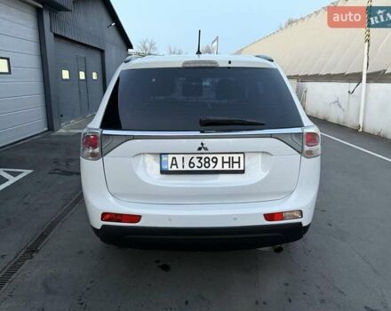 Білий Міцубісі Аутлендер, об'ємом двигуна 2.4 л та пробігом 154 тис. км за 12999 $, фото 6 на Automoto.ua