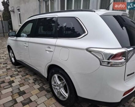 Белый Мицубиси Аутлендер, объемом двигателя 2.3 л и пробегом 247 тыс. км за 14100 $, фото 12 на Automoto.ua