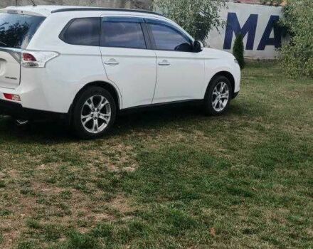 Білий Міцубісі Аутлендер, об'ємом двигуна 2.4 л та пробігом 300 тис. км за 12500 $, фото 3 на Automoto.ua