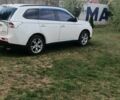 Білий Міцубісі Аутлендер, об'ємом двигуна 2.4 л та пробігом 300 тис. км за 12500 $, фото 3 на Automoto.ua