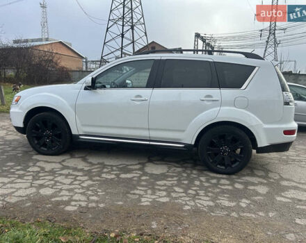 Белый Мицубиси Аутлендер, объемом двигателя 2.2 л и пробегом 226 тыс. км за 10999 $, фото 4 на Automoto.ua